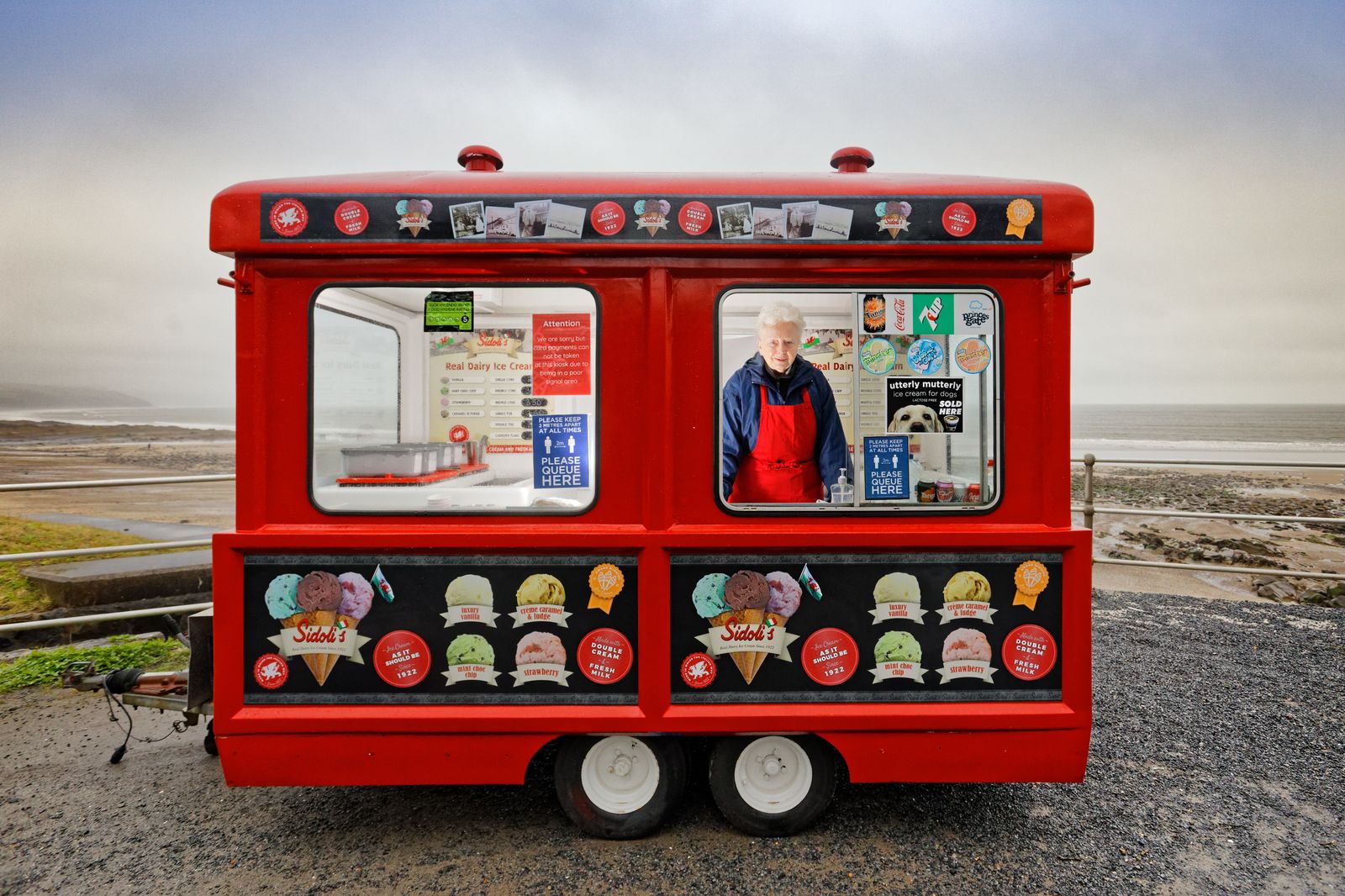 Carol Rees who sells ice lollies near Saundersfoot after Covid-19 lockdown measures are relaxed in Wales, UK